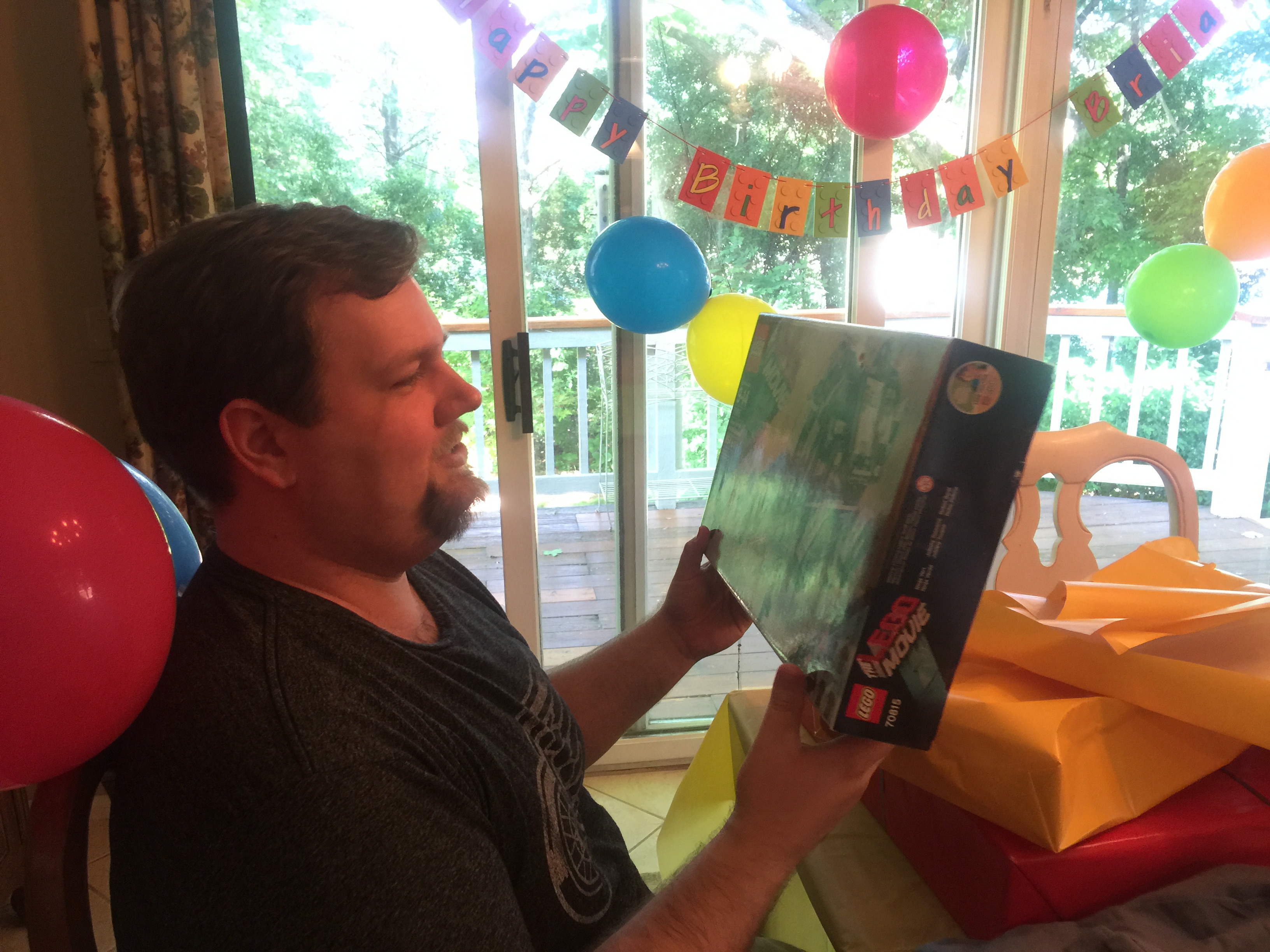 Brian opening some of his presents.