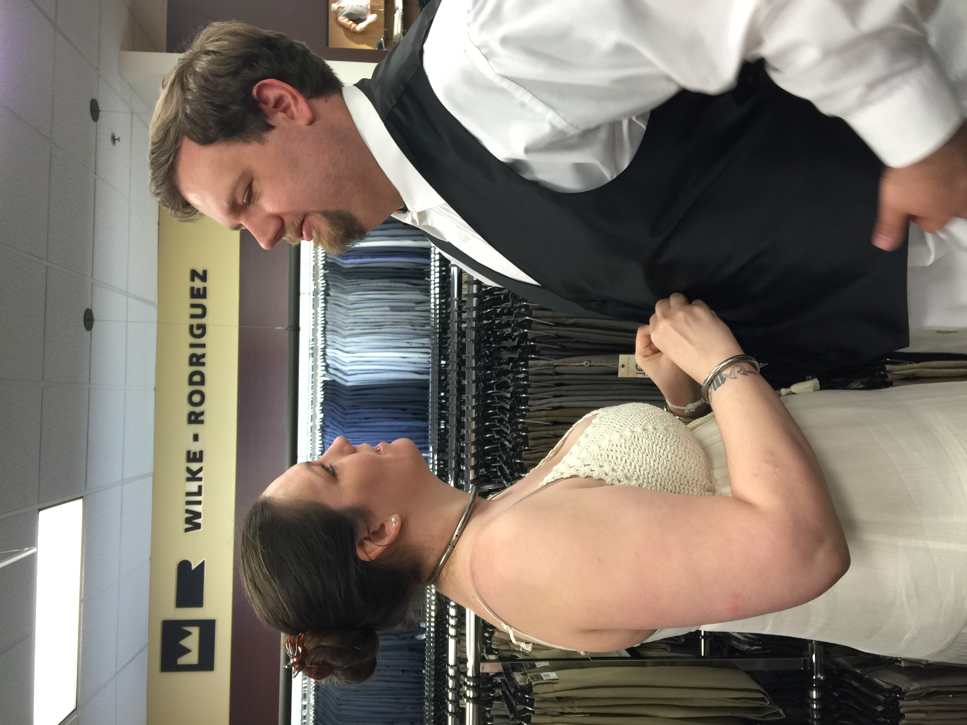 Buttoning the vest. It looks like i was made for this ;p 